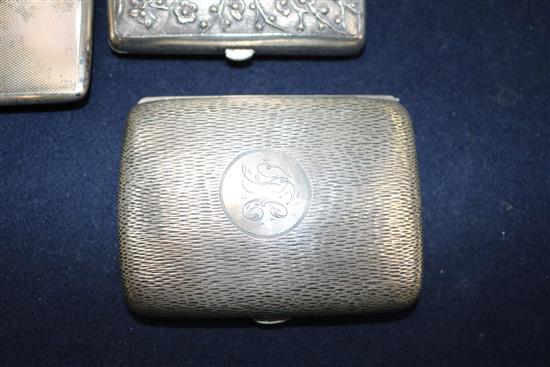 Two silver cigarette cases and a Chinese white metal cigarette case decorated with dragons and prunus, gross weight 8.8 oz.
